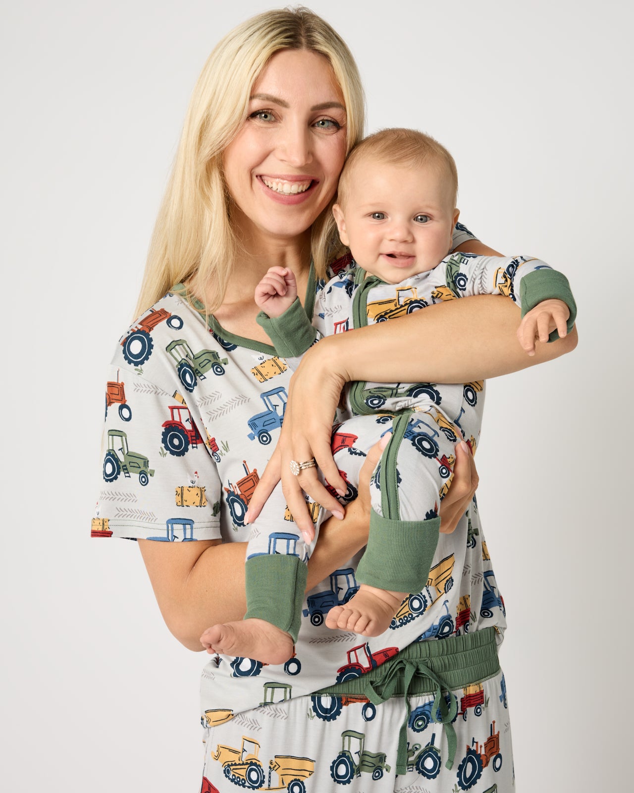 Mother and child wearing matching Tractor Tales PJs