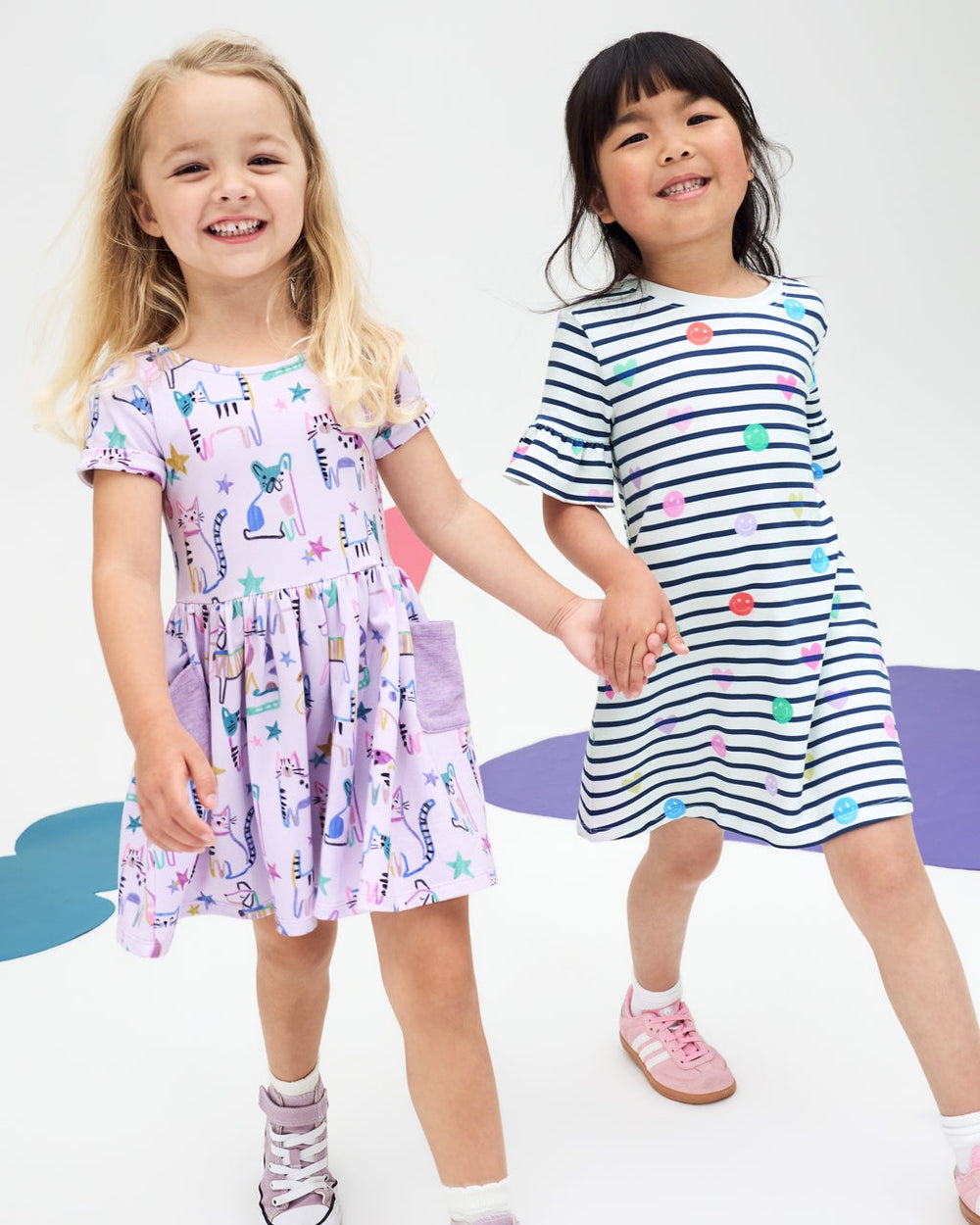 Two girls wearing Back to School dresses