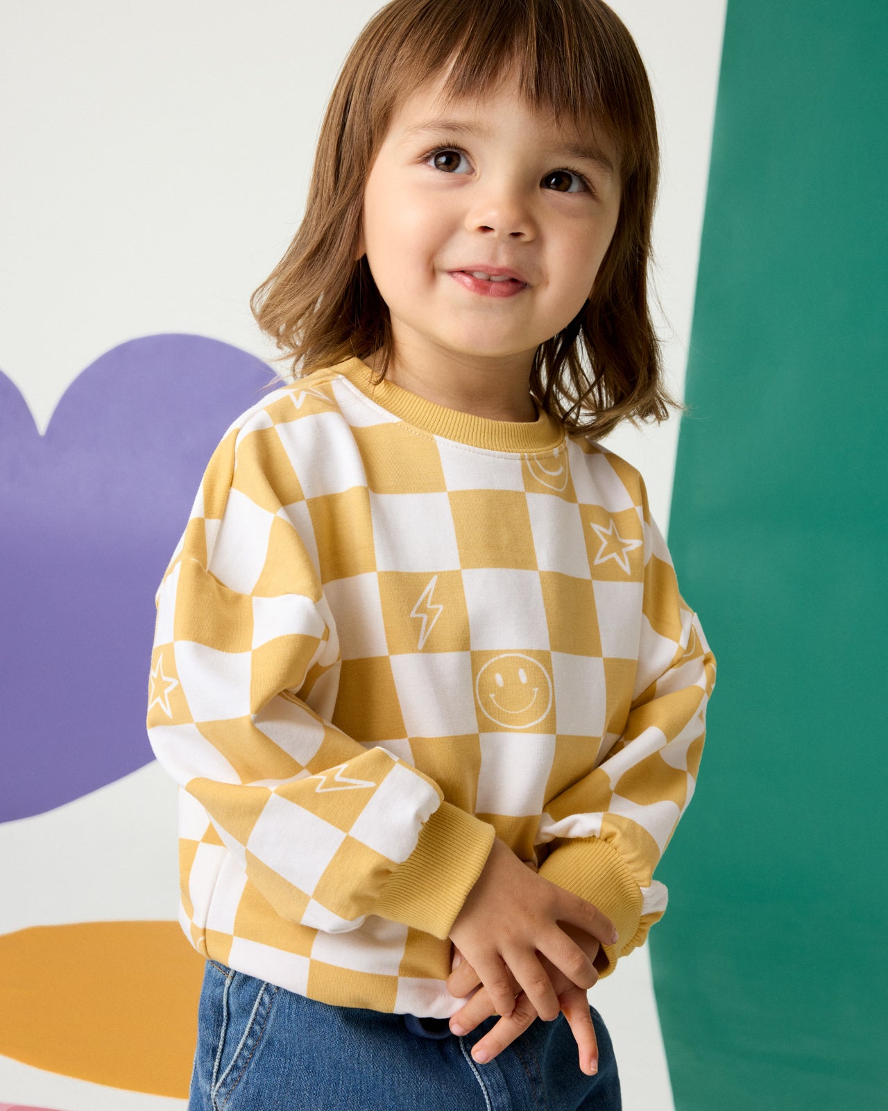 Child wearing the Cheery Checks Drop Shoulder Sweatshirt
