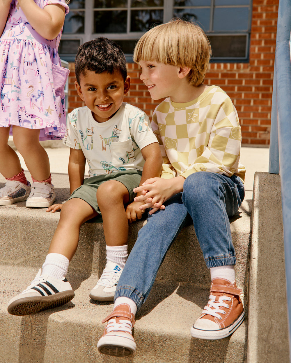 Two kids wearing Back to School daywear styles
