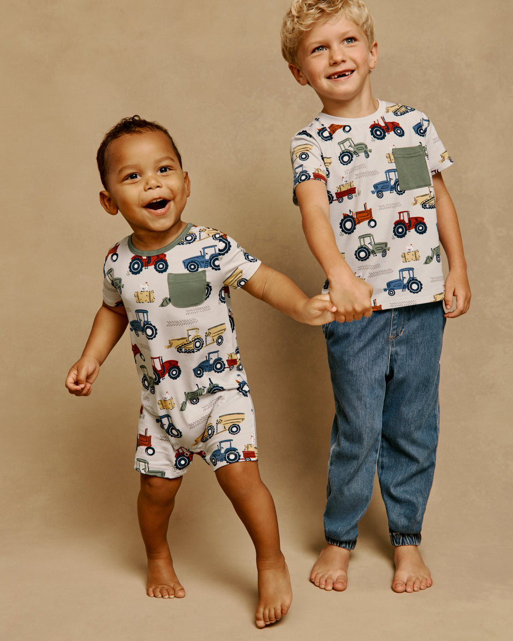 Two children wearing matching Tractor Tales styles