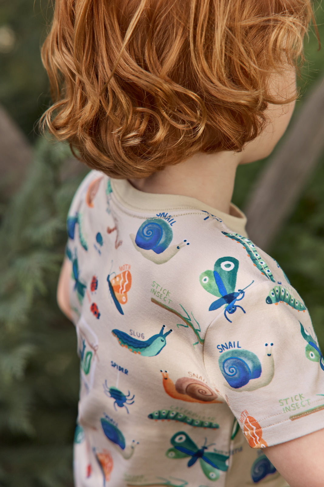 Close up of the insect print on the Nature Notes Relaxed Pocket Tee