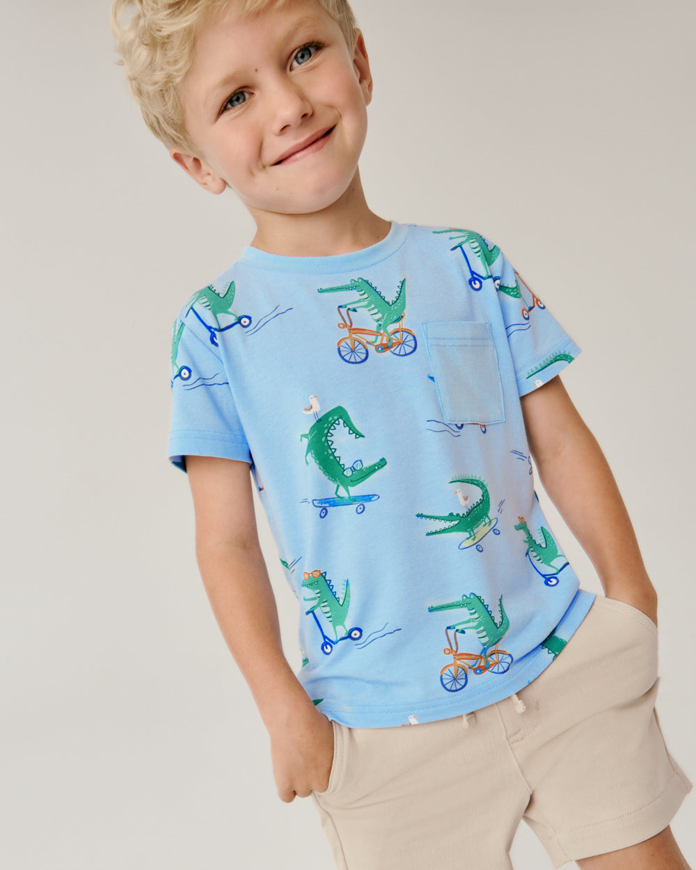 Boy wearing the Lator Gator Relaxed Pocket Tee