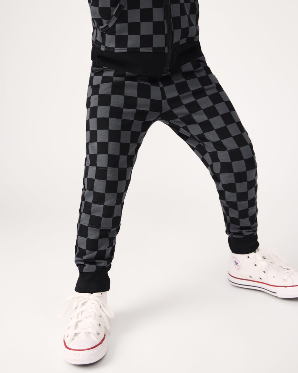 Close up of child wearing the Monochrome Checks Jogger