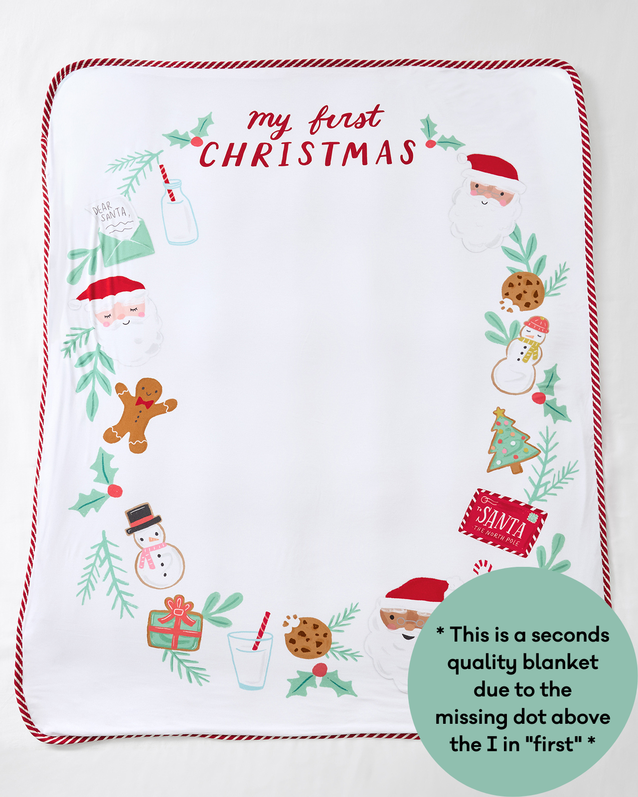 Flatlay of "My First Christmas" Blanket with text overlay stating " * this is a seconds quality blanket due to the missing dot above the I in "first:* "