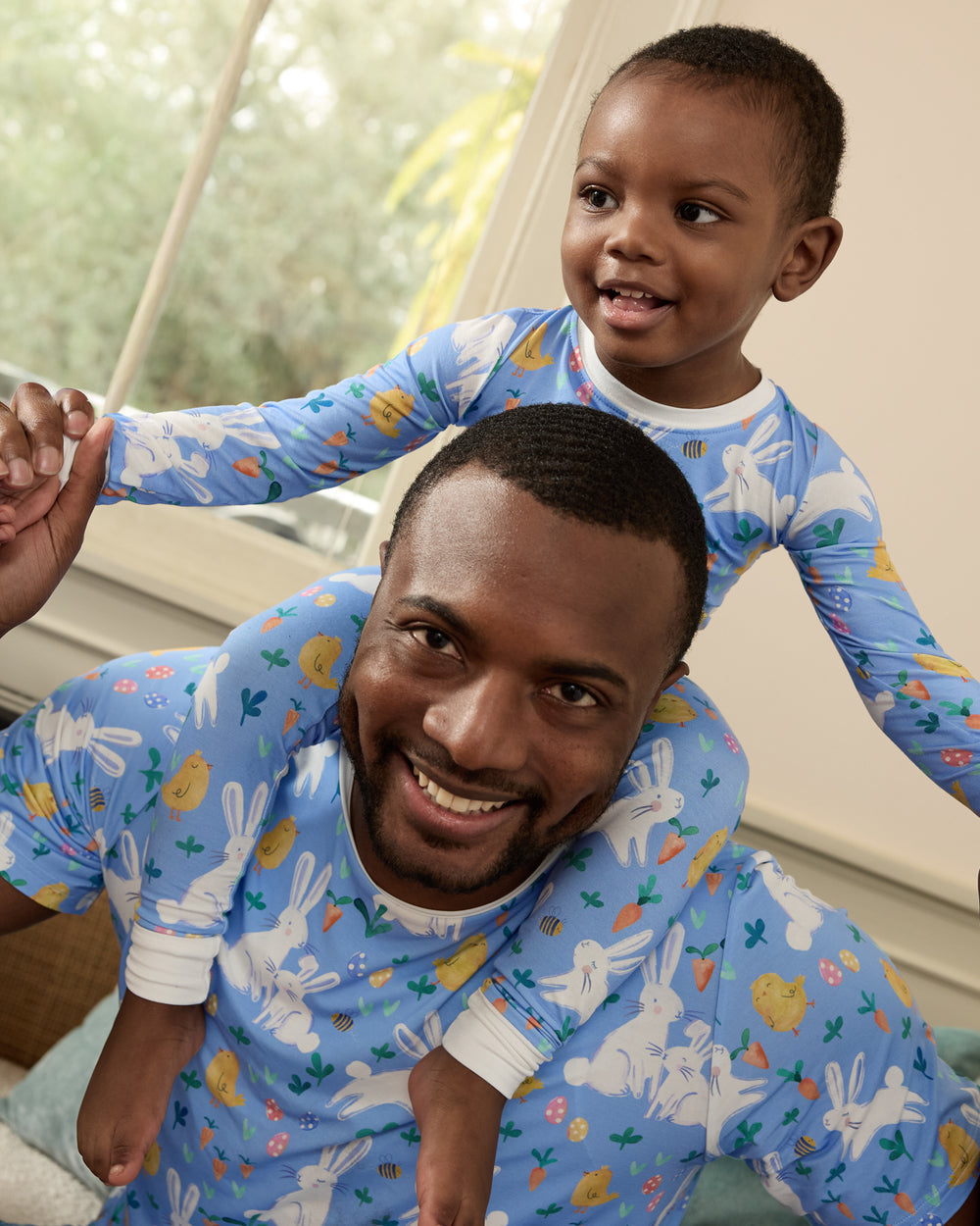 Father and son wearing matching Bunny Patch pajamas
