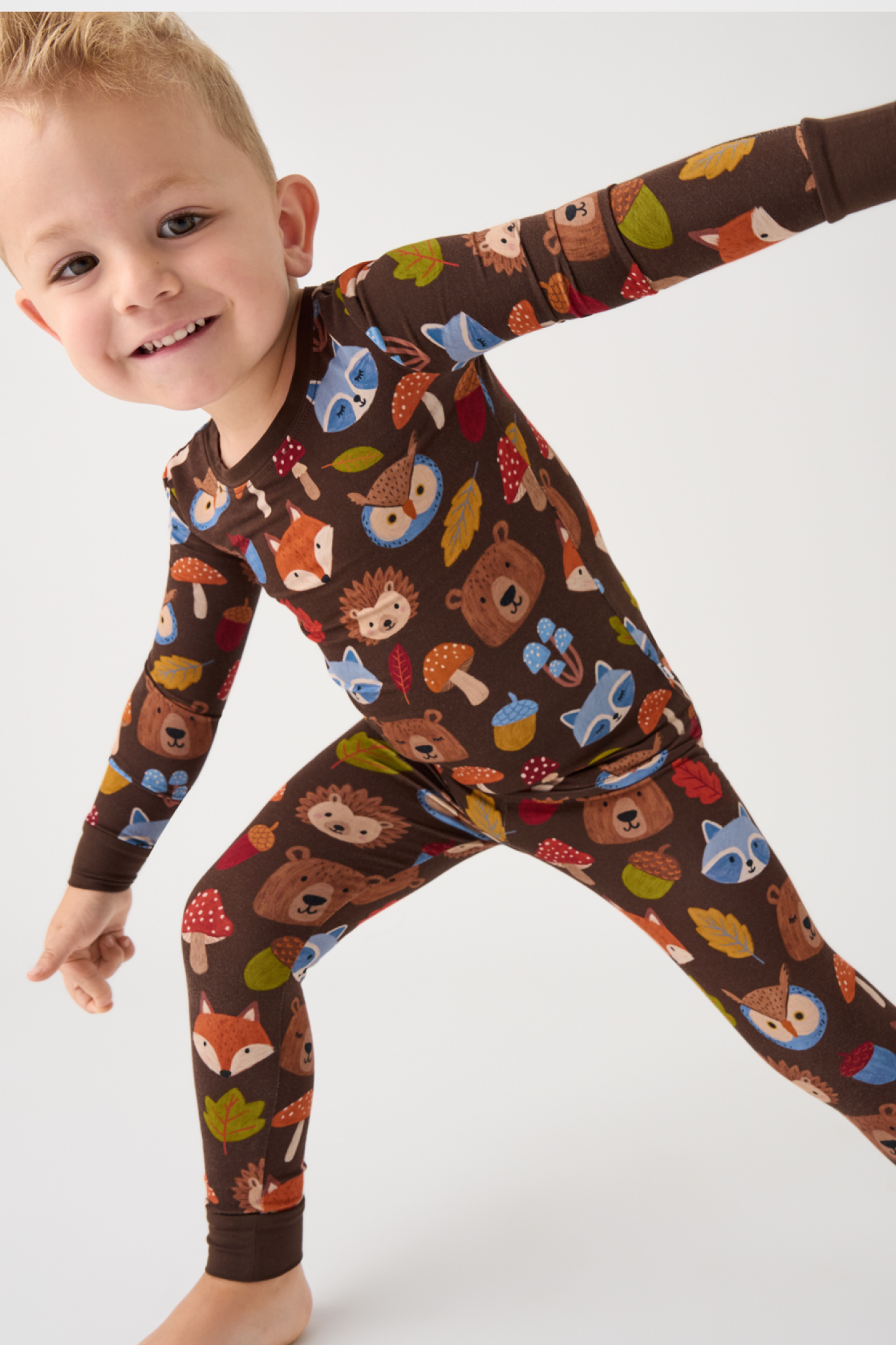 Child wearing a Forest Crew Two-Piece Pajama Set