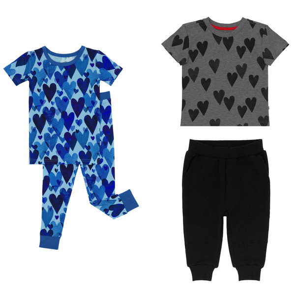 flat lay composite of a blue hearts & crafts two-piece short sleeve pajama set, heather hearts relaxed tee, and black jogger