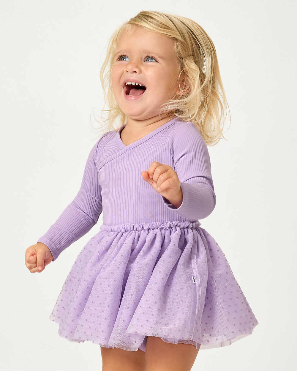 Close up of toddler wearing the Orchid Bloom Layered Tulle Dress with Bloomer