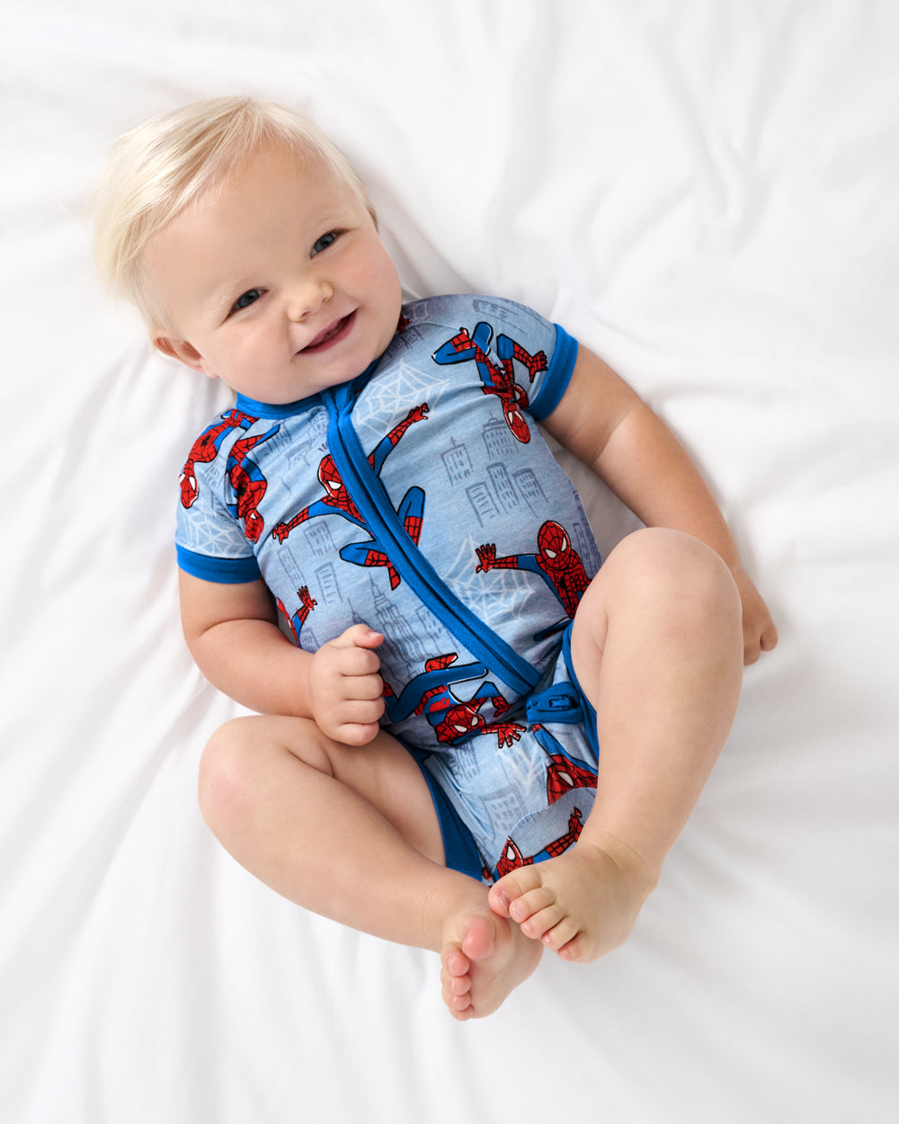 Aerial view of baby wearing the Spidey Sense Shorty Zippy