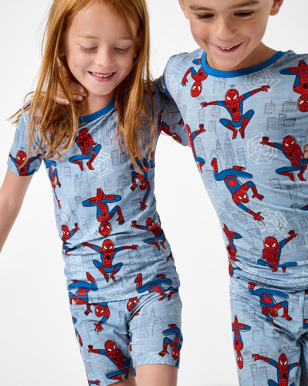 Close up of two children wearing matching Spidey Sense Two-Piece Pajama Sets