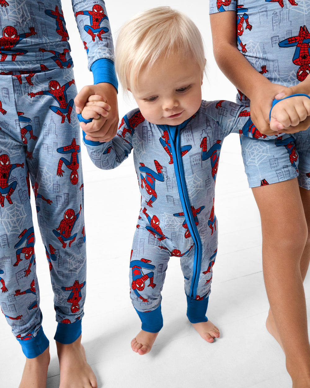 Walking baby wearing the Spidey Sense Zippy