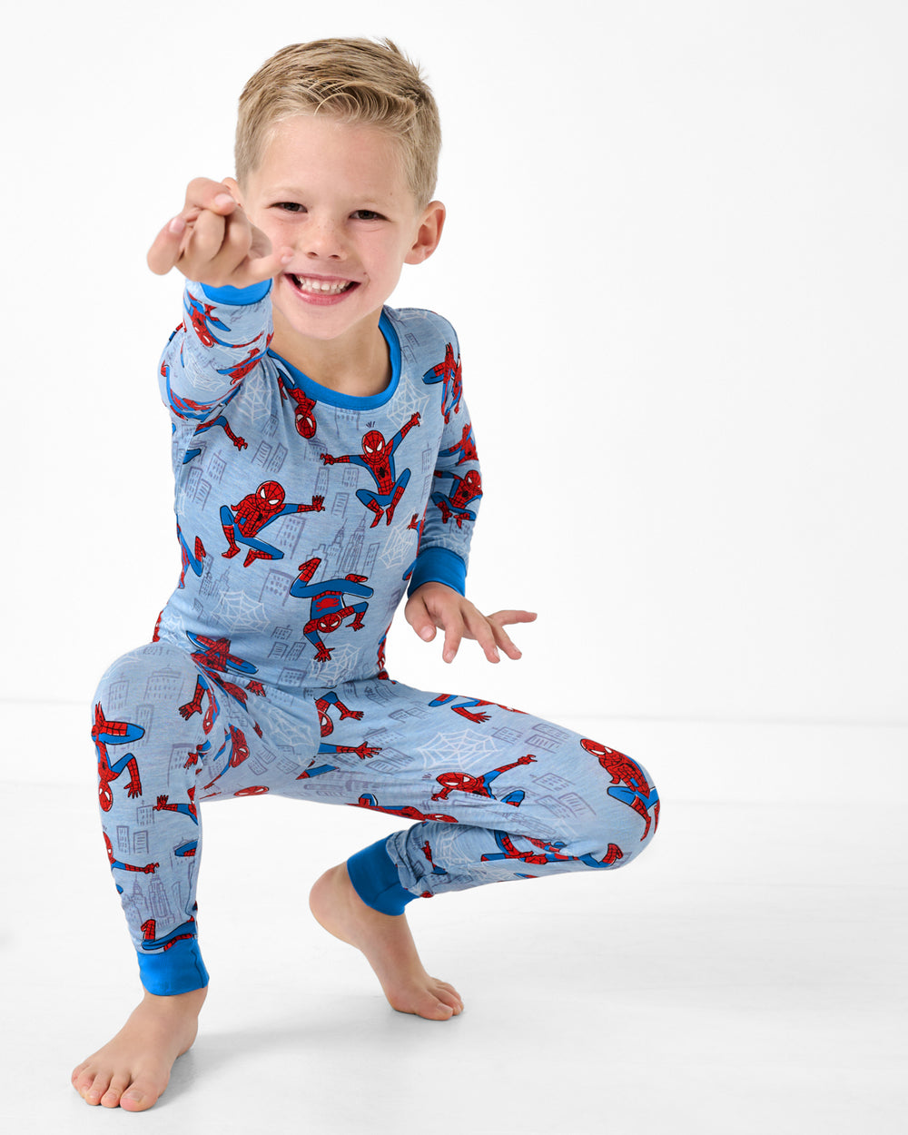 Posing boy wearing the Spidey Sense Two-Piece Pajama Set
