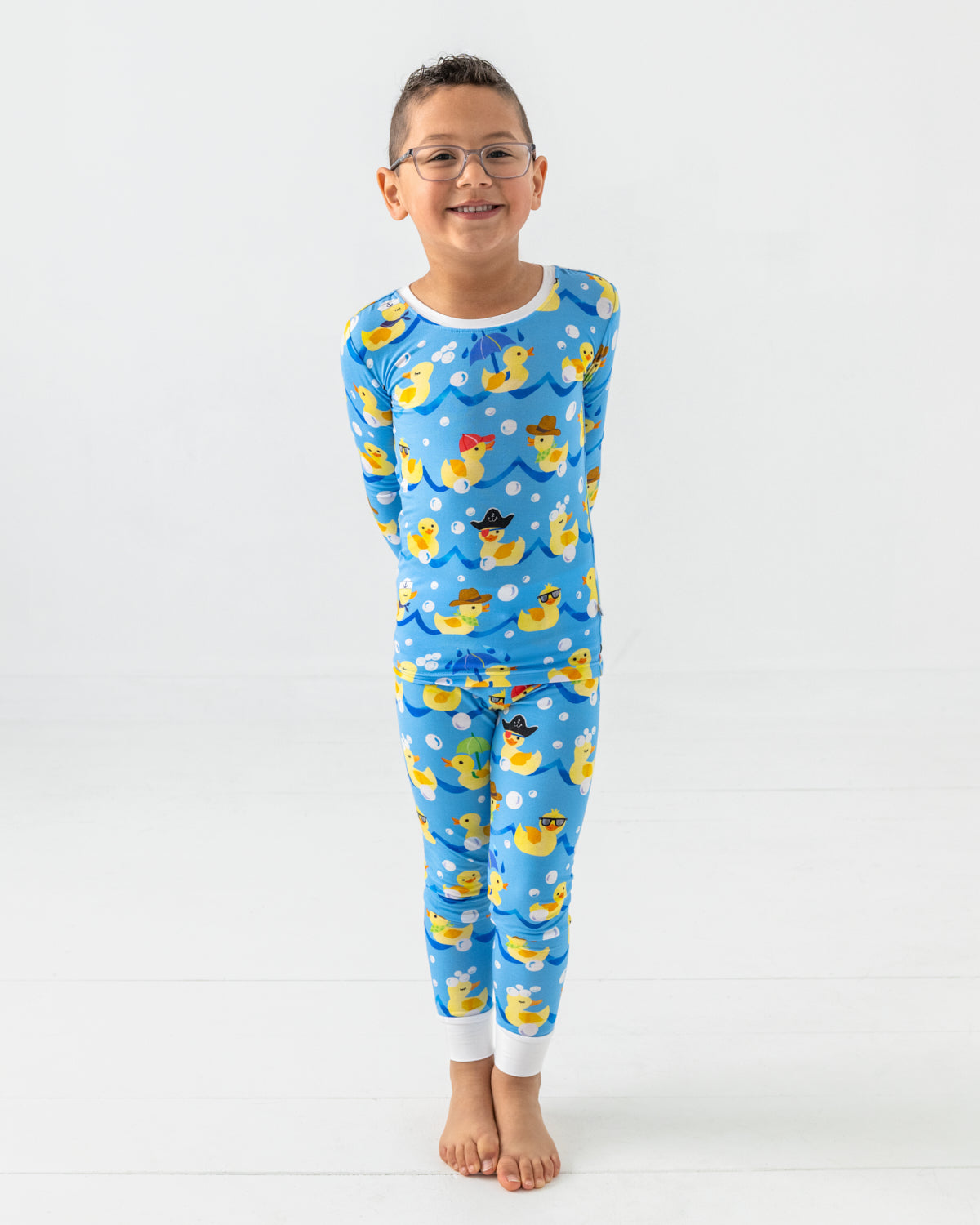 Boy wearing the Splish Splash Two-Piece Pajama Set