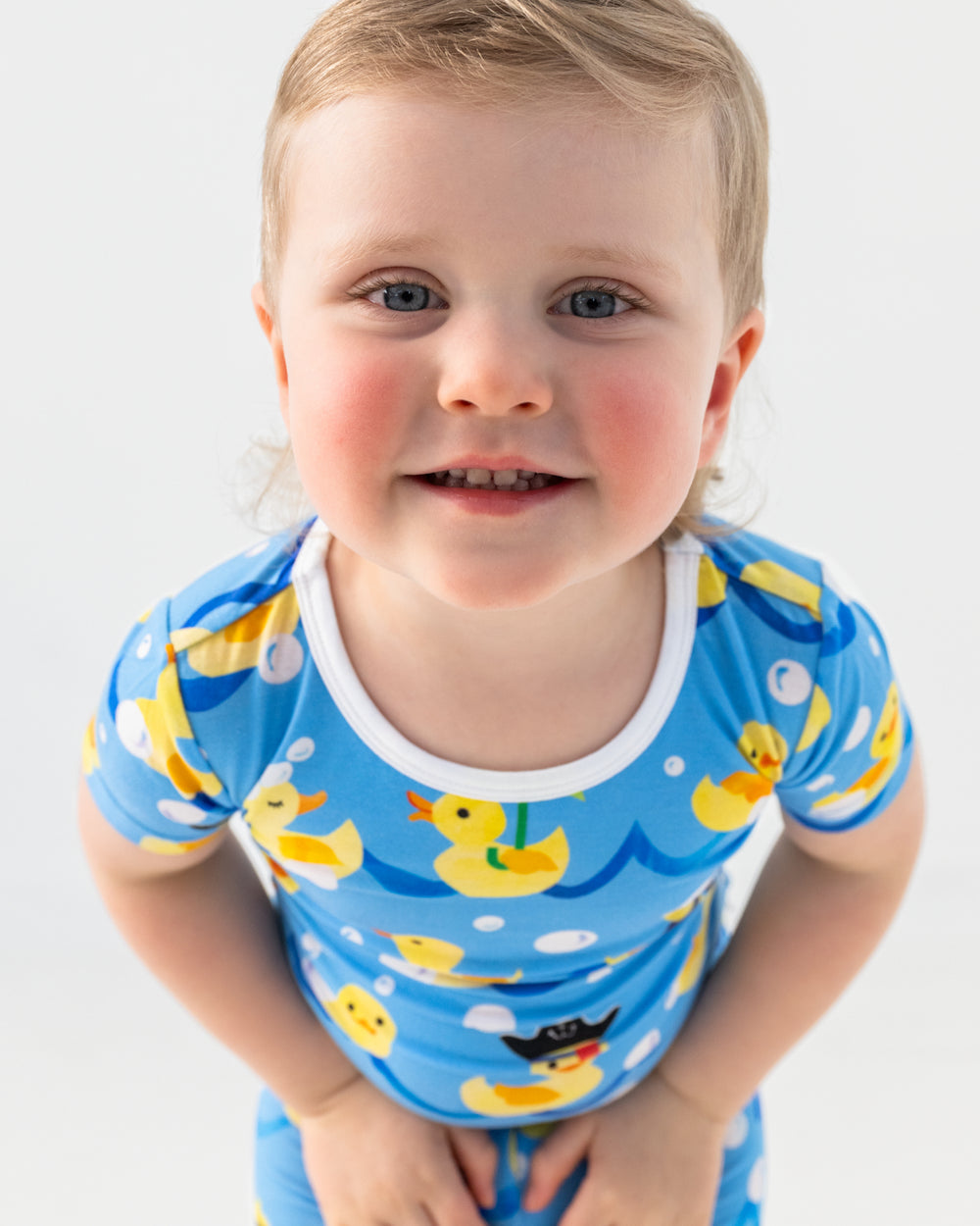 Close up of boy wearing the Splish Splash Two-Piece Bamboo pajamas