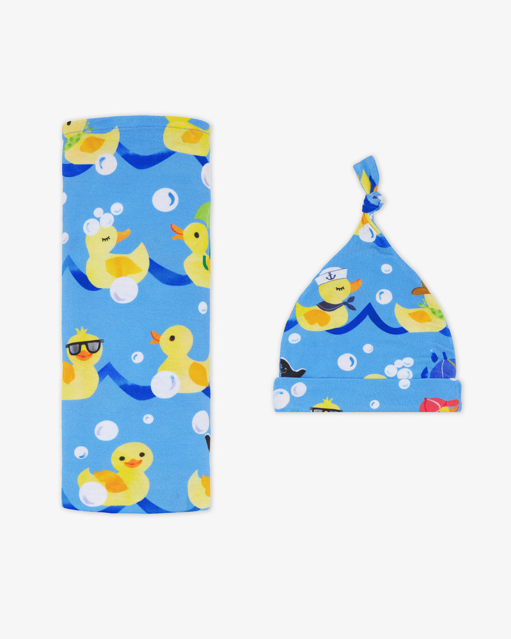 Flat lay of the Splish Splash Swaddle & Hat Set