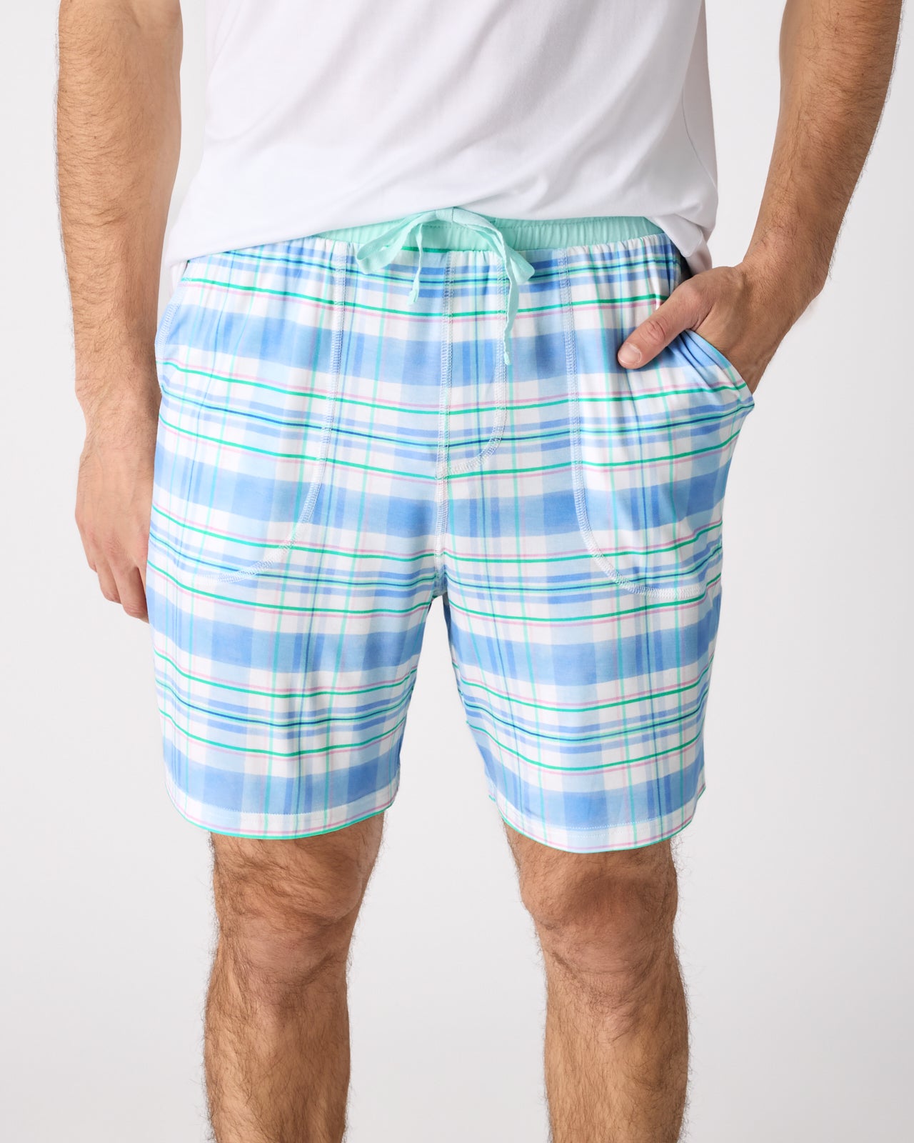 Man wearing the Springtime Plaid Men's Pajama Shorts