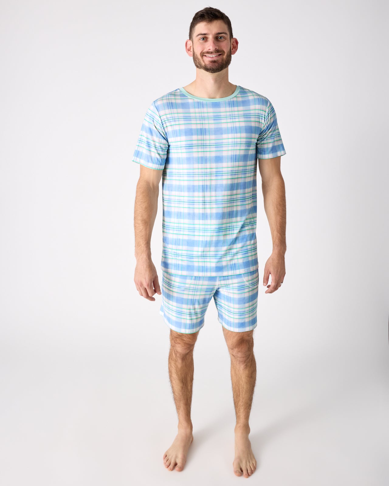 Man wearing the Springtime Plaid Men's Pajama Shorts and Shirt