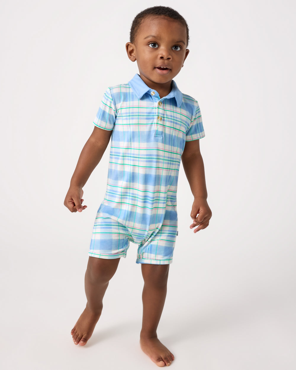 Toddler wearing the Springtime Plaid Polo Shorty Romper