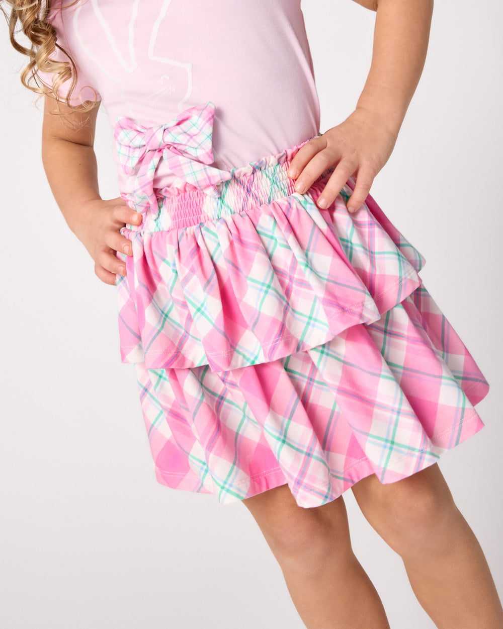 Close up of girl wearing the Springtime Plaid Tiered Skort