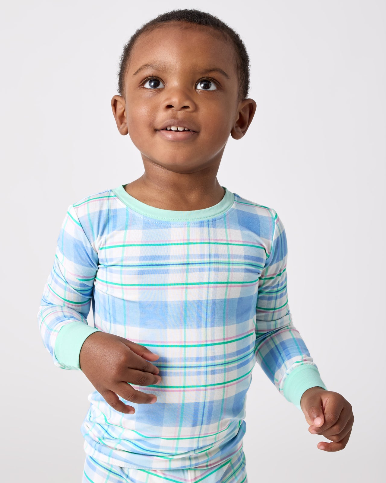 Close up of bow wearing the Springtime Plaid Two-Piece Pajama Set
