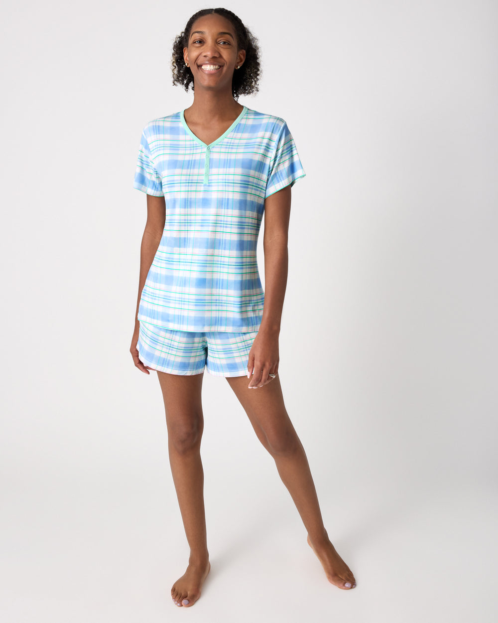 Alternate woman wearing the Springtime Plaid Women's Short Sleeve Pajama Top and Shorts