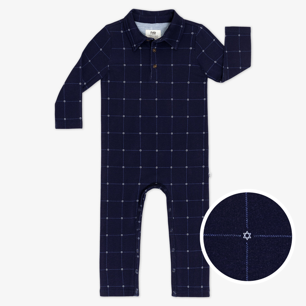 flat lay image of polo romper highlighting Star of David detail