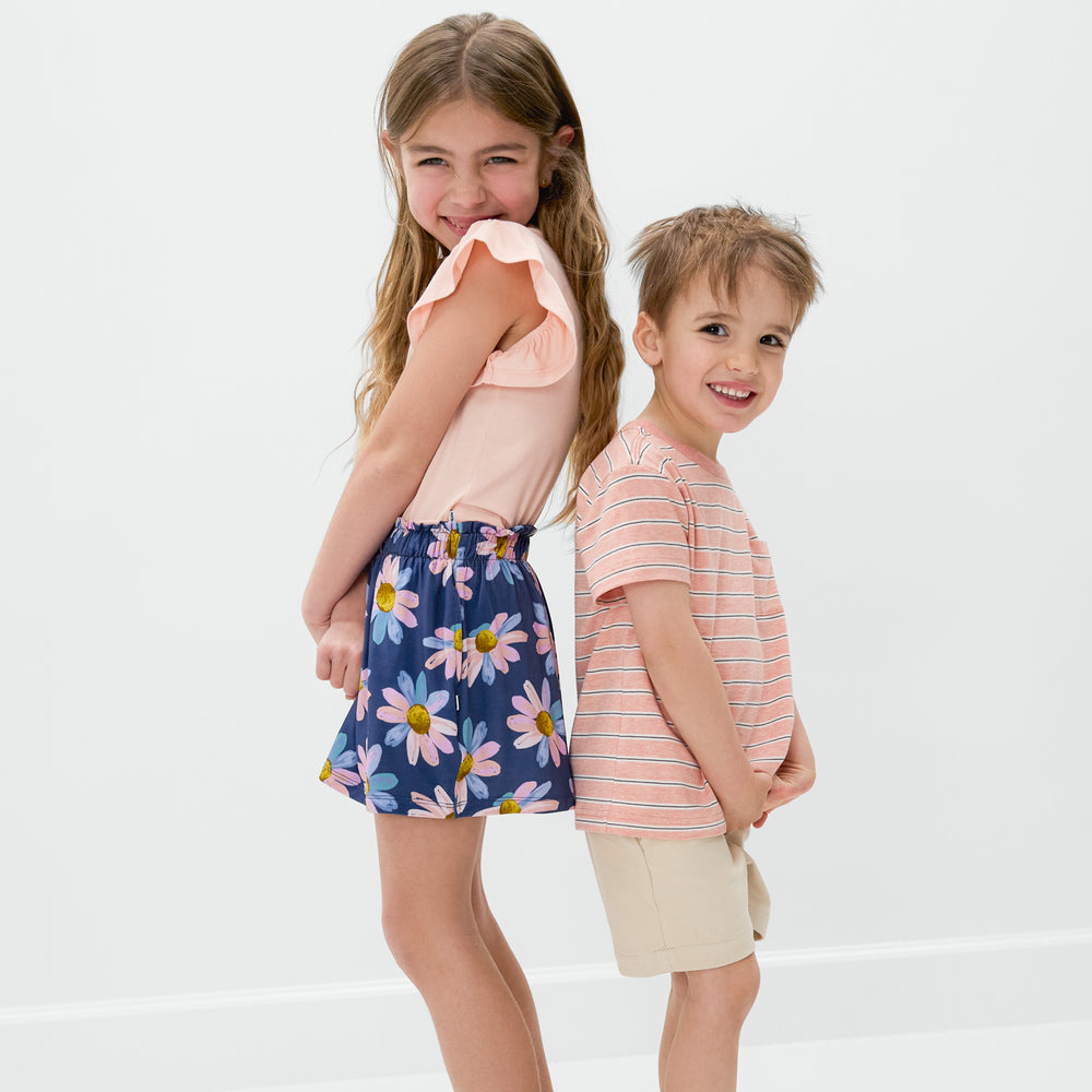 Two children wearing bamboo clothing styles from the Spring Play Collection