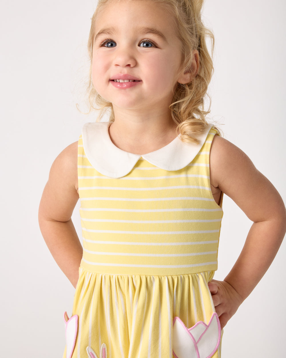 Close up of girl wearing the Sunny Tulip Collar Skater Dress
