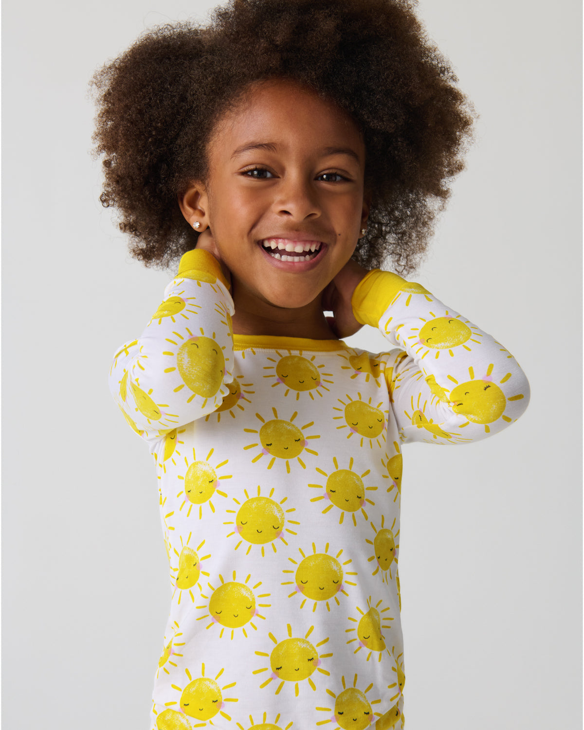 Close up of girl wearing the Sunshine Two-Piece Pajama Set
