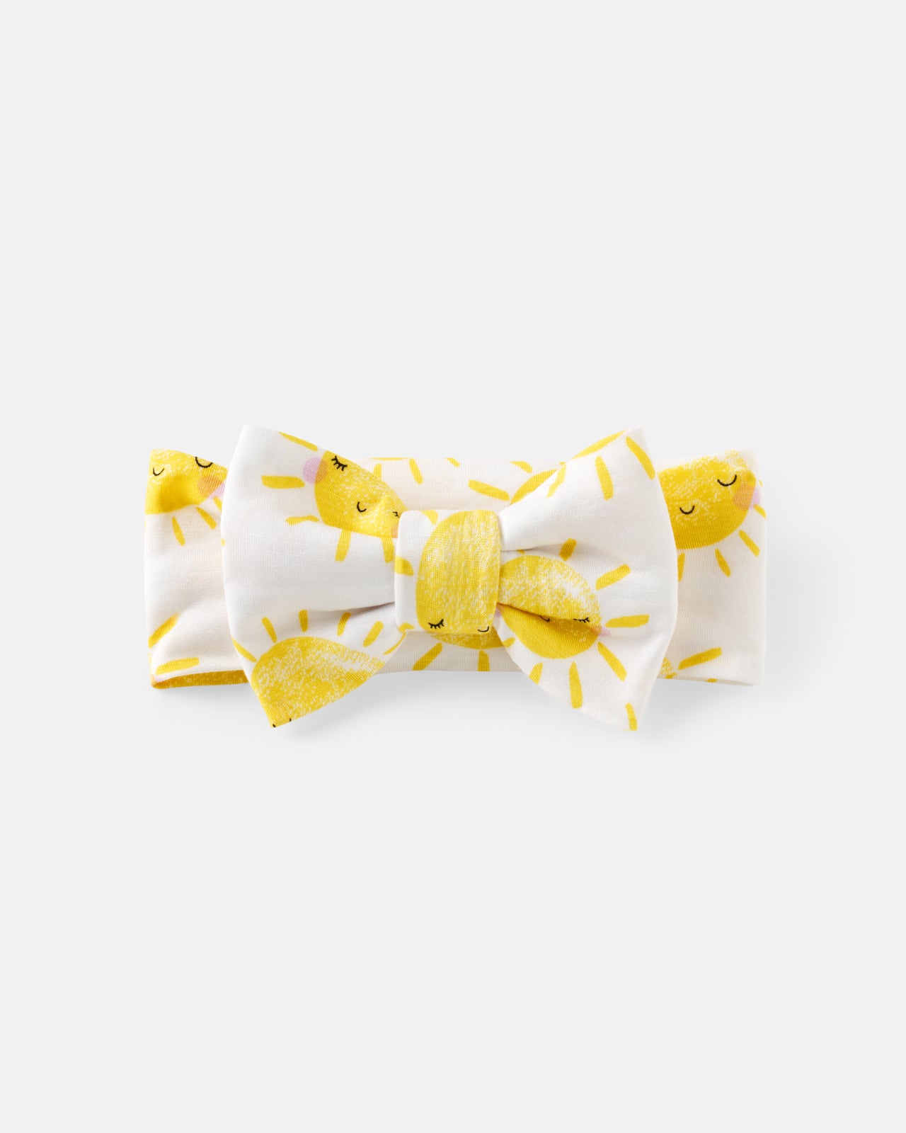 Flat lay of the Sunshine Luxe Bow Headband