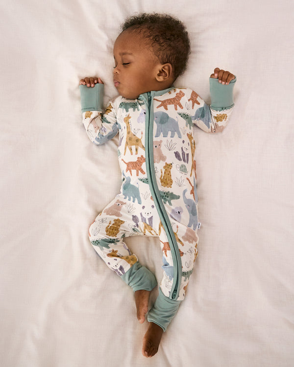 Aerial view of sleeping baby wearing the Sweet Safari Zippy