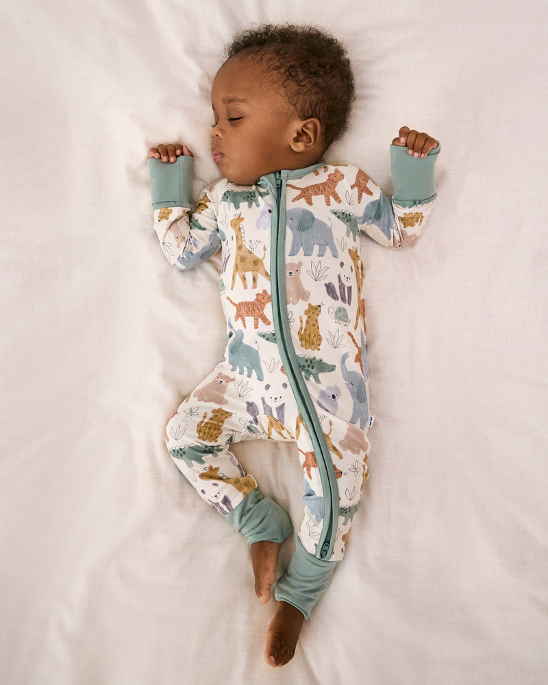 Aerial view of sleeping baby wearing the Sweet Safari Zippy
