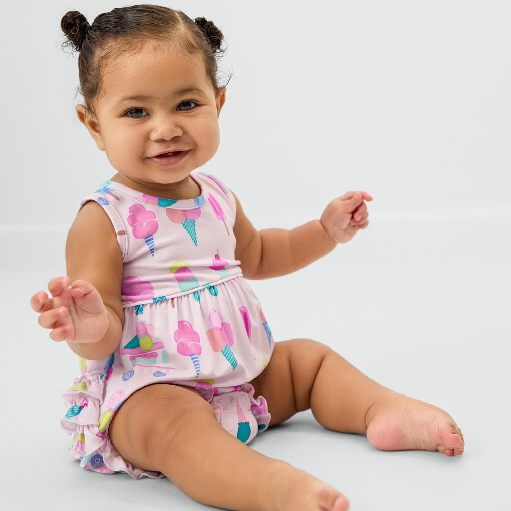 Sitting baby wearing the Pink Sweet Scoops Bubble Romper
