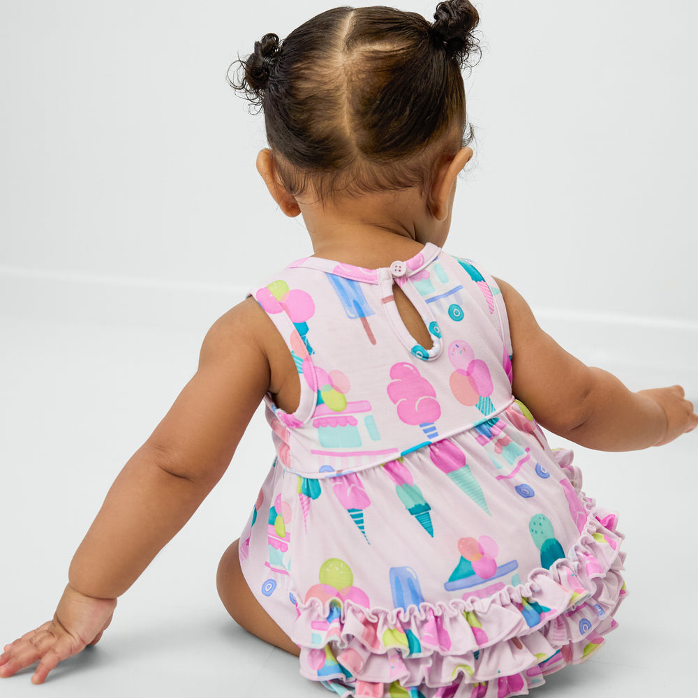 Back view of baby wearing the Pink Sweet Scoops Bubble Romper