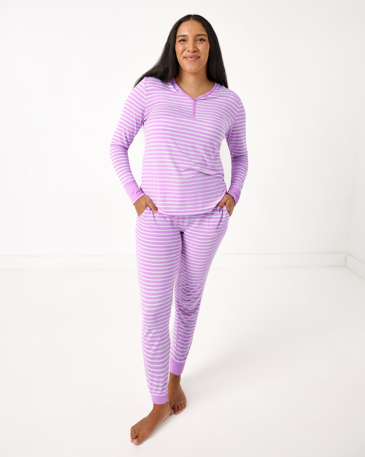 Woman wearing the Sweet Orchid Stripe Women's Pajama Pants and Top