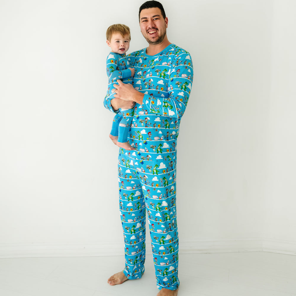 Click to see full screen - Father and son wearing matching Disney Pixar Toy Story Pals pajamas