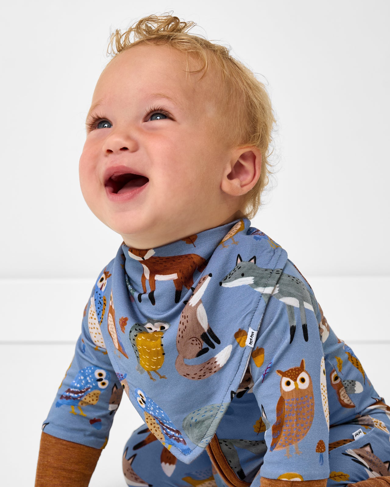 Close up of baby wearing the Twilight Pals Bandana Bib