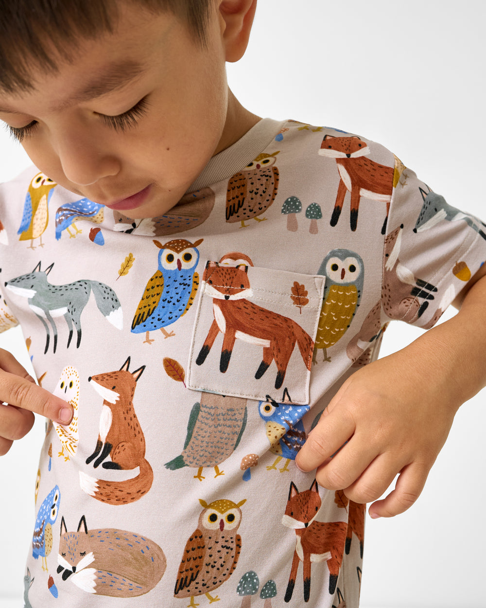 Close up of the pocket detail on the Twilight Pals Relaxed Pocket Tee