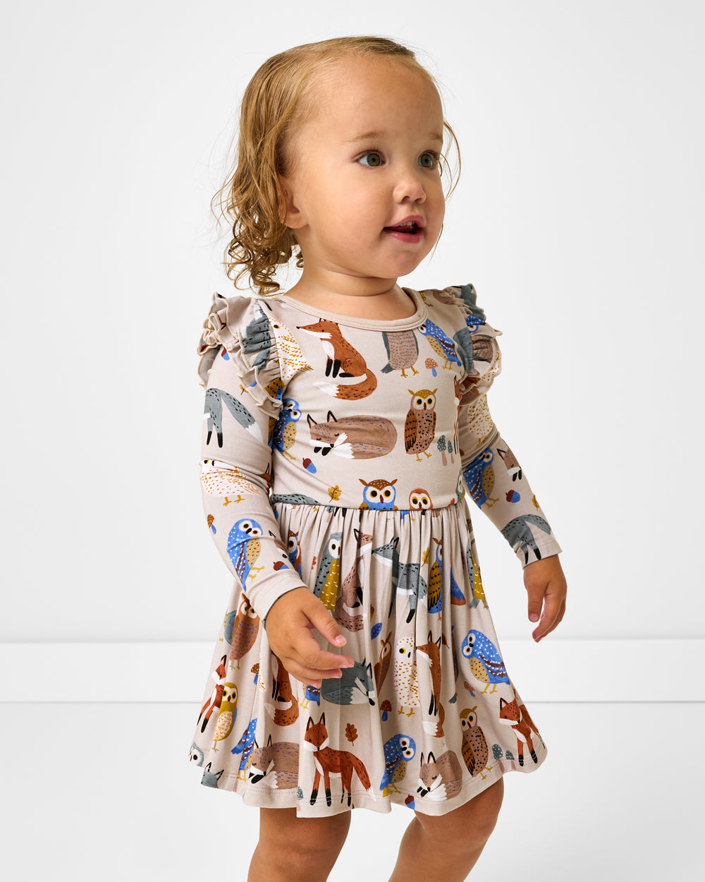 Girl wearing the Twilight Pals Flutter Skater Dress with Bodysuit