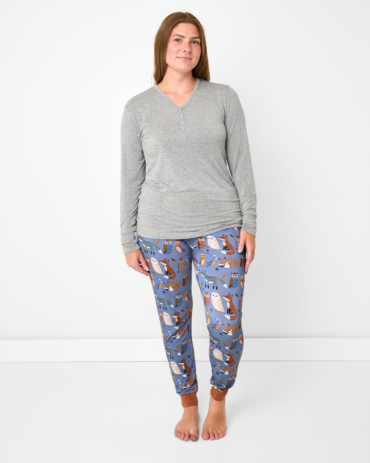 Standing woman wearing the Twilight Pals Women's Pajama Pants with a gray top