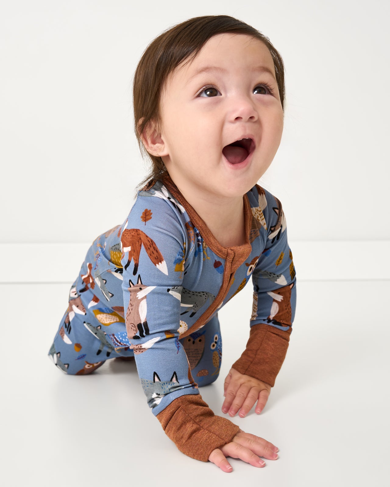 Crawling baby wearing the Twilight Pals Zippy