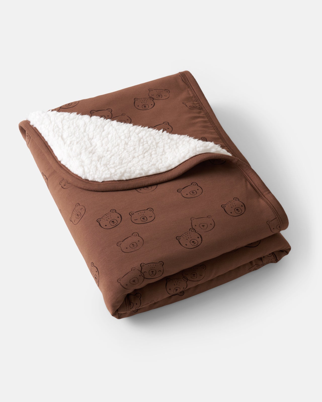 Flat lay of the Teddy Tracks Mini Cloud Blanket®