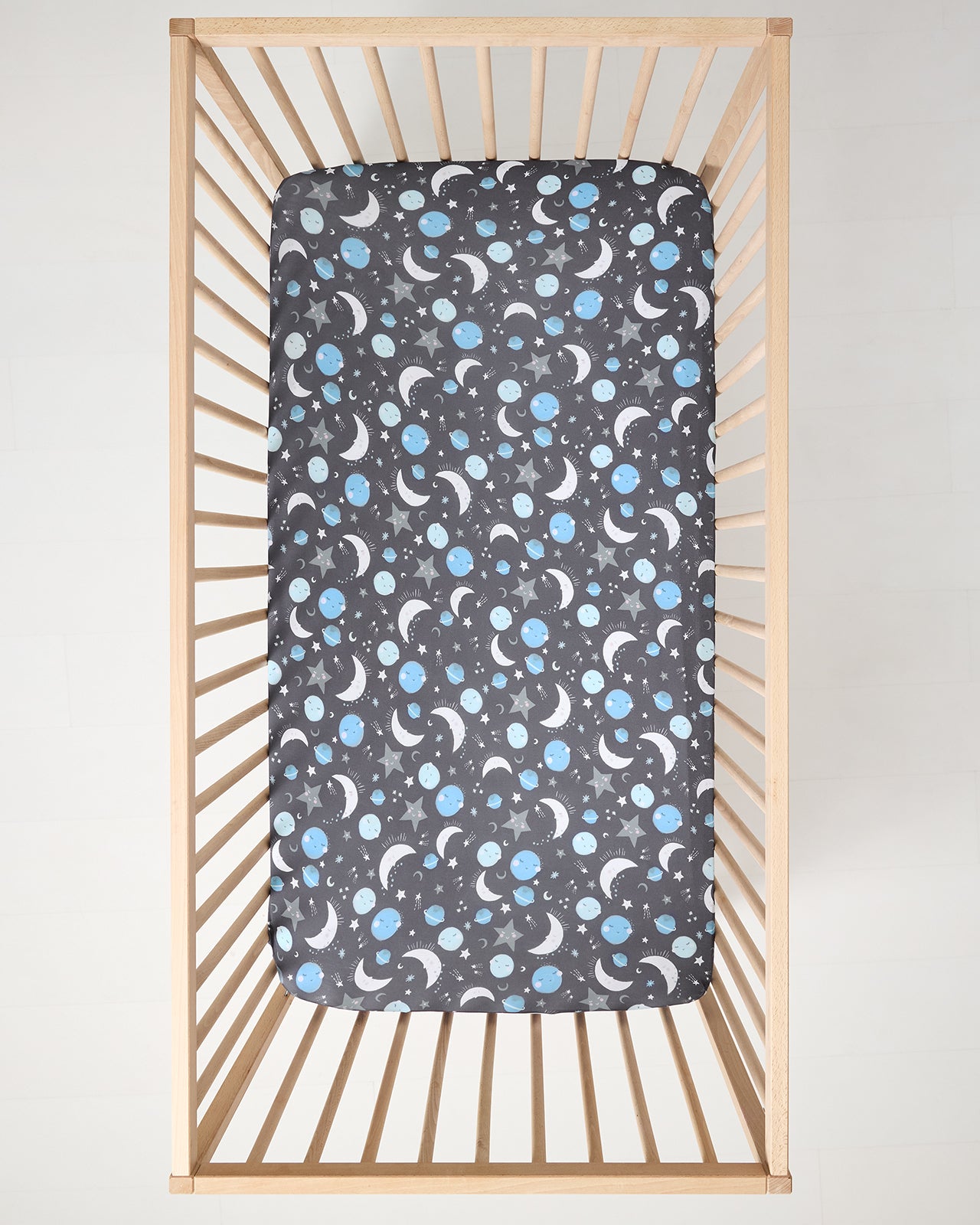 Aerial view of the Blue To the Moon & Back Fitted Crib Sheet