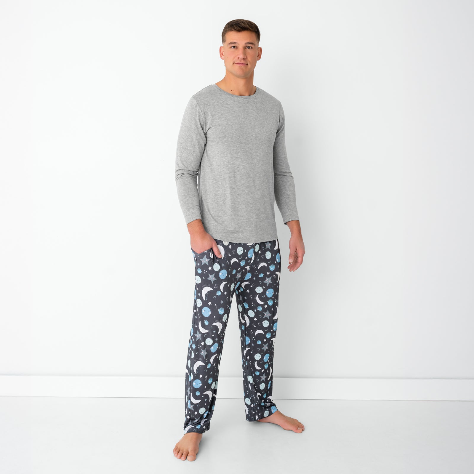 Standing man wearing the Blue To the Moon & Back Men's Pajama Pants