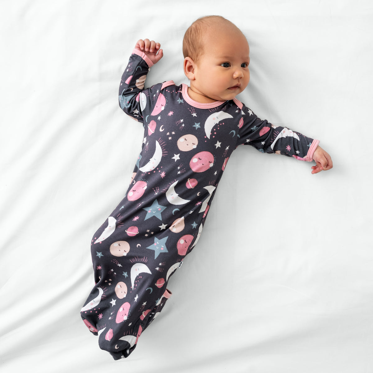 Alternate aerial view of child wearing the Pink To the Moon & Back Infant Gown