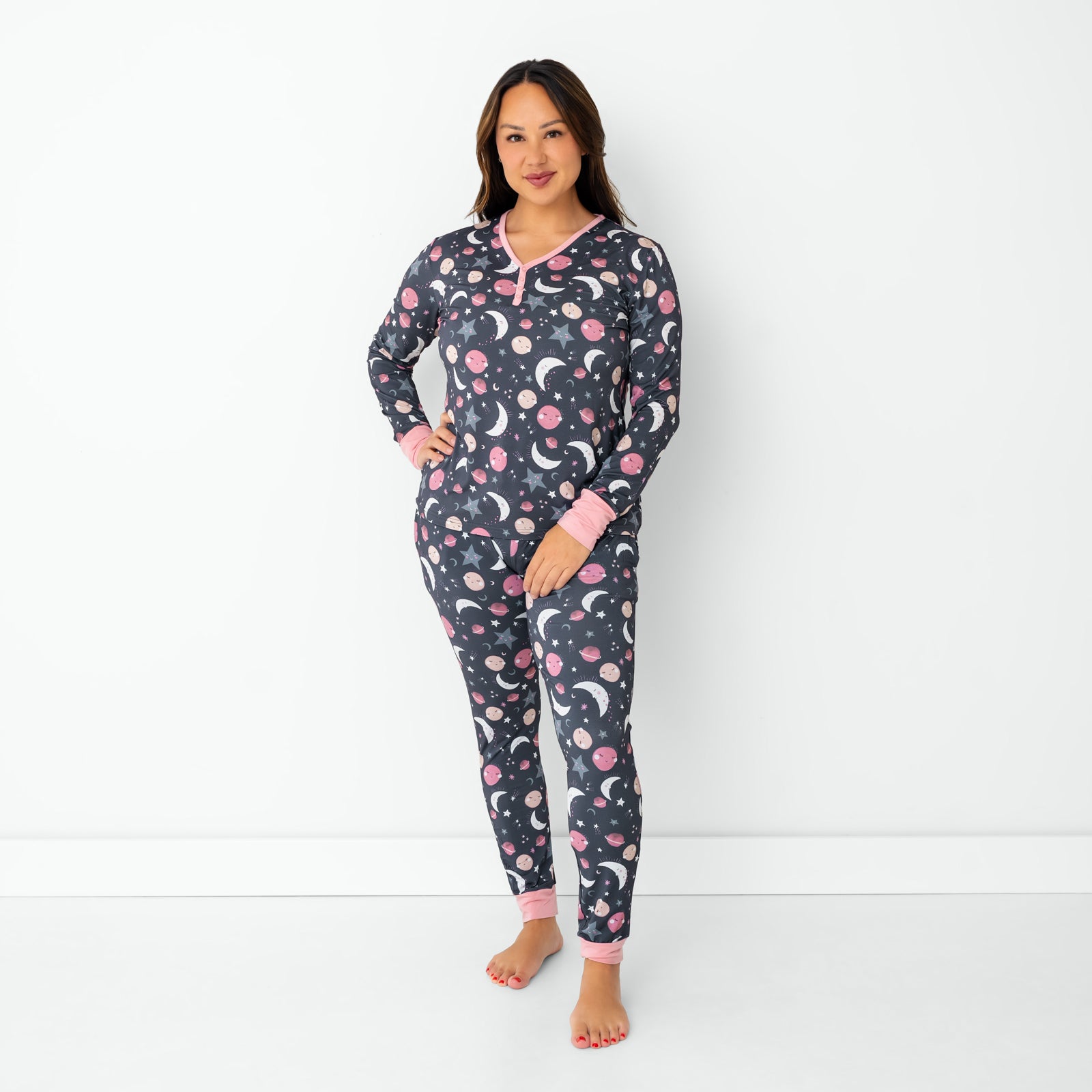Standing woman wearing the Pink To the Moon & Back Women's Bamboo Pajama Top