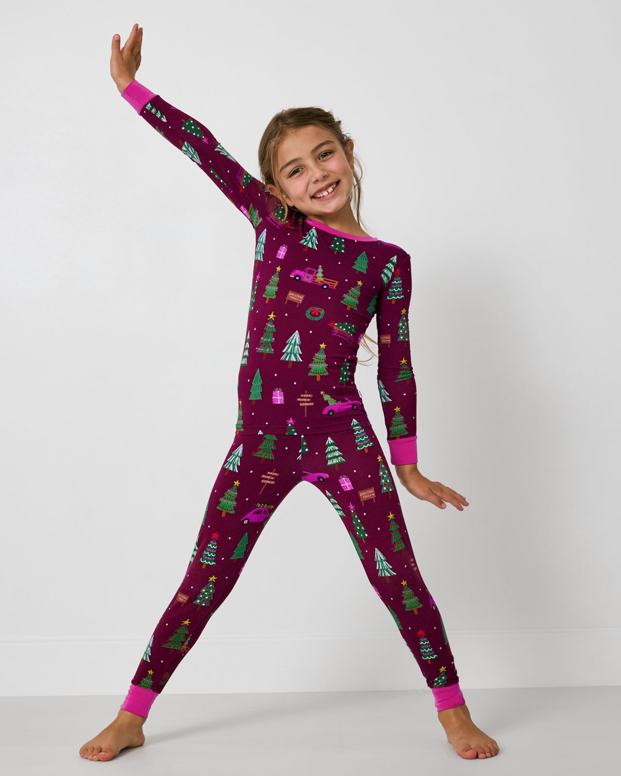 Posing girl wearing the Cranberry Tree Traffic Two-Piece Pajama Set