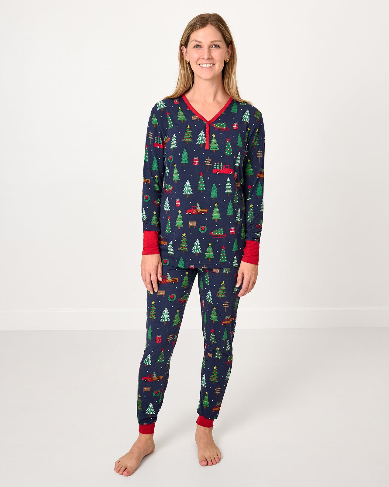 Woman wearing the Navy Tree Traffic Women's Pajama Pants with the coordinating pajama top