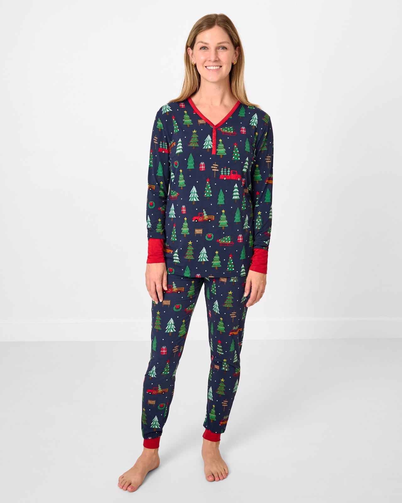 Woman wearing the Navy Tree Traffic Women's Pajama Pants with the coordinating pajama top